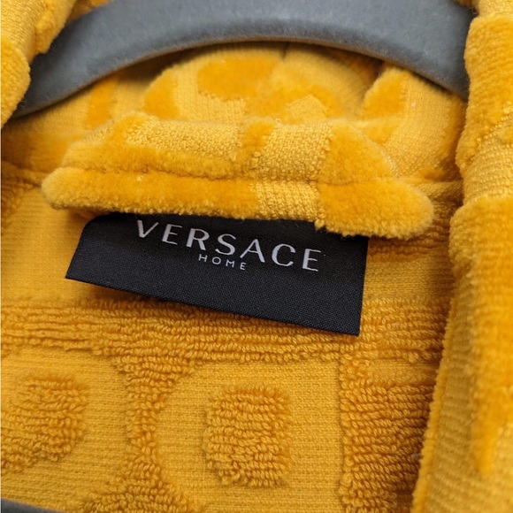 genuine Versace gold robe with box.
Barely worn, retails for $725 - Picture 5 of 5